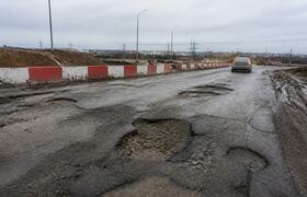 Ремонт разбитой дороги на въезде в Ижевск запла...